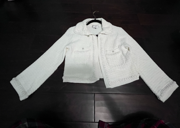 chanel white jacket.png